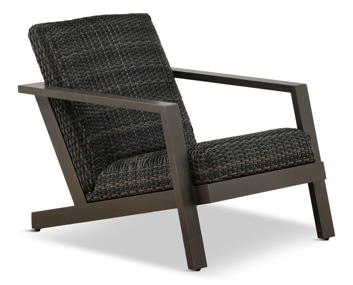 Dark brown wicker chair on a white background
